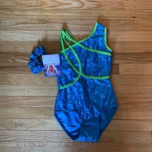 Child Leotard, size child large with matching scrunchie.